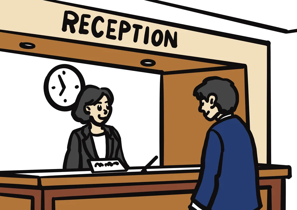 ホテルの受付で会話をする様子を表したイラスト