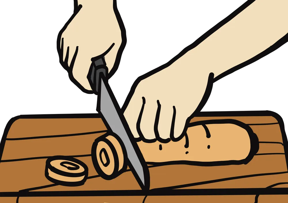 包丁でにんじんを切る様子を表したイラスト