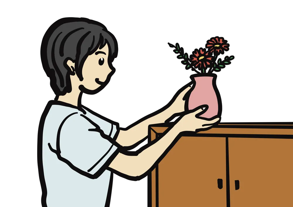 花瓶を棚に置く様子を表すいイラスト