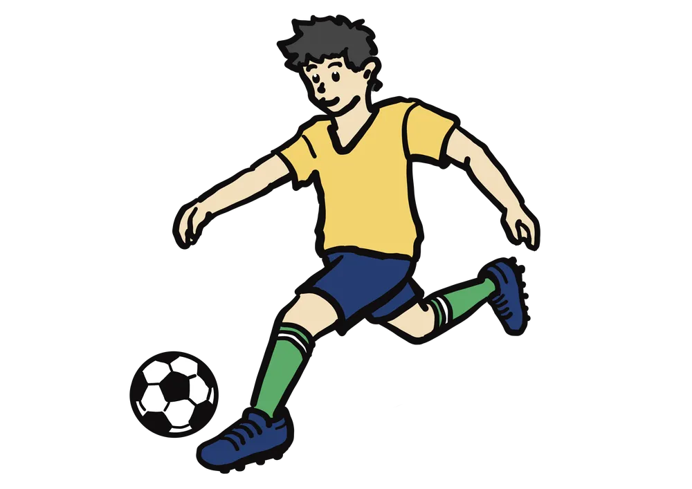 サッカーボールを蹴る男性