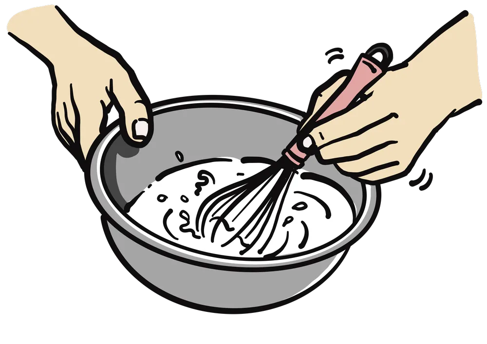 ステンレスボウルに入った生クリームを泡立て器で混ぜる様子